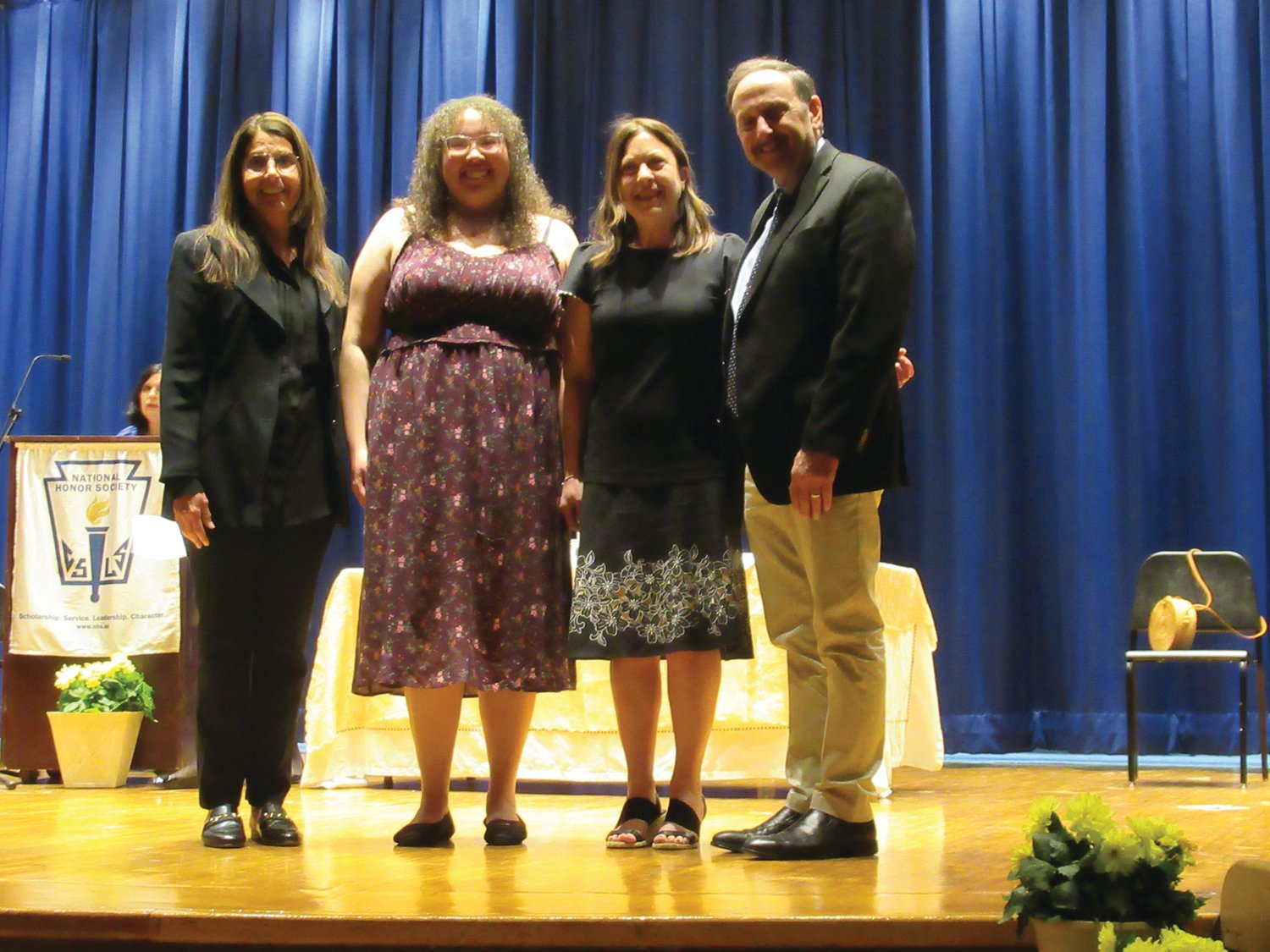 NATIONAL NICHE: Glorianna Crichlow, president of the JHS National Honor Society, is joined by Assistant Supt. Julie Zarrella, Advisor Emilia Ruggiero and Supt. Dr. Bernard DiLullo at last week’s National Honor Society Induction Ceremony.